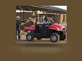 Big Red's rugged, composite plastic doors and side netting create one of the safest MUV cabs going