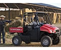 Big Red's rugged, composite plastic doors and side netting create one of the safest MUV cabs going